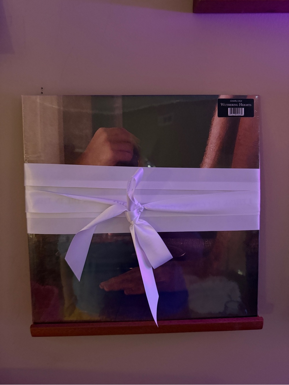 Vinyl Record Album with White Ribbon Accent